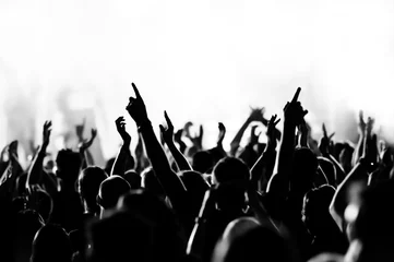 Foto op Plexiglas concert crowd in front of bright blue stage lights © DWP
