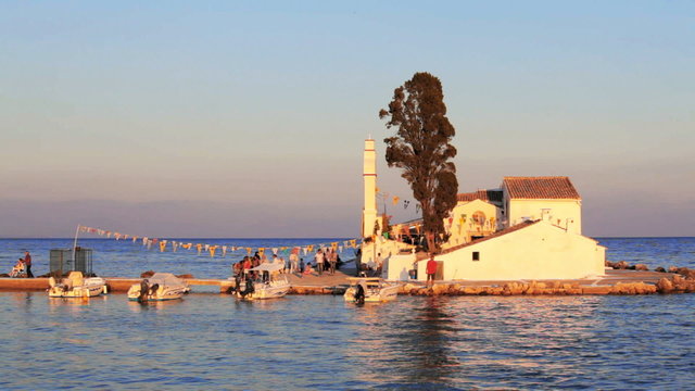 Sunset scene of Vlacherna monastery, Kanoni, Corfu, Greece