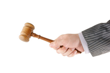 Judge's gavel in hand isolated on white © Valerii Evlakhov