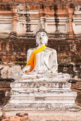 Buddha statue in front of pagoda