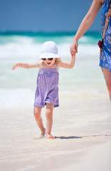 Little cute girl at beach