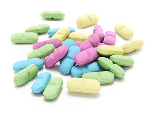 Many colored pills on white