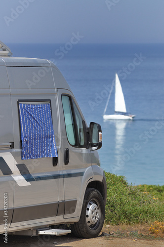 Camper In Sosta Sulla Spiaggia Di Scivu Sardegna Italia