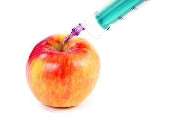 Spritze und Apfel