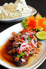 Herb spicy salad with Saba fish teriyaki sauce (Thai fusion food
