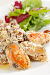Fricassee with seafood and salad