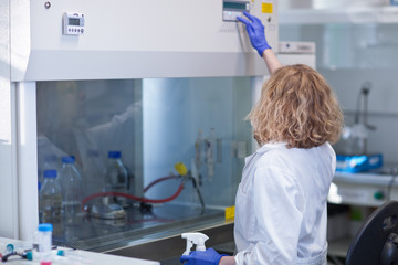 portrait of a female researcher doing research in a lab