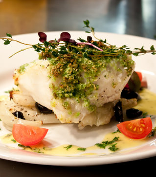 fish with black olivs