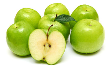 Green apple fruits and half of apple and green leaves
