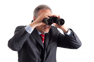 Manager using binoculars