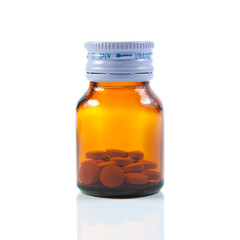 Closed vial of pills