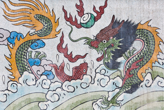 dragon  and fish painting on mable wall