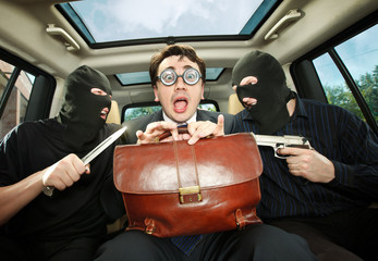 businessman grasped in hostages.