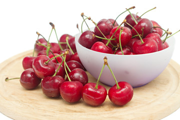 lots of fresh cherries isolated on white