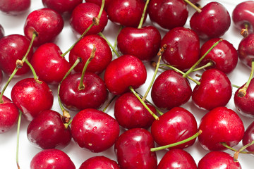 lots of fresh cherries isolated on white