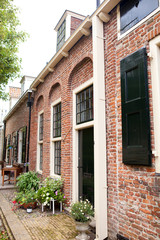 Fototapeta na wymiar Street with typical Dutch houses