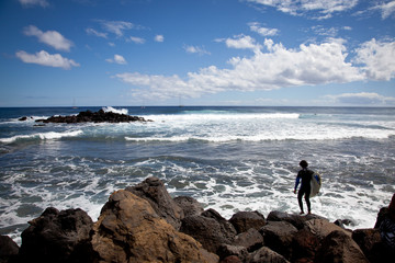 Fototapeta na wymiar Surfing nearby Easter Island Coastline
