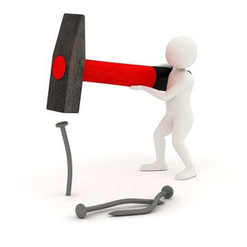 3d man hitting and bending nail