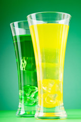 Colourful cocktail in glasses with ice