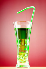 Colourful cocktail in glasses with ice