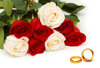 Wedding concept with roses and rings