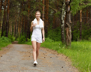 Young woman doing sport outdoors