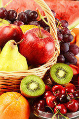 Composition with variety of fruits in wicker basket