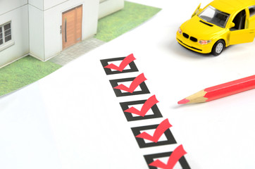 Check box and car with house