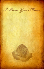 Message "I love you mom" with rose on old vintage paper with spa
