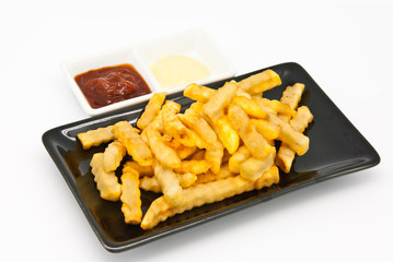French fries in black plate