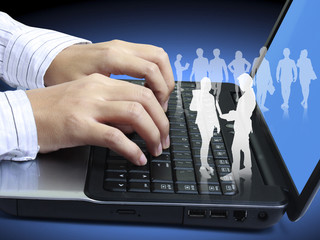 hands on the laptop keyboard