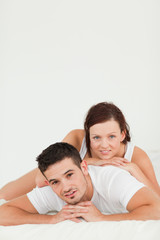 Portrait of a Beautiful Woman lying on her man