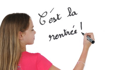 Ecolière au tableau.