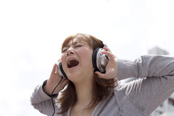 Asian woman in headphone