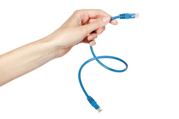 Female hand holding blue USB cable, isolated on white