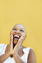 mature african woman smiling for joy