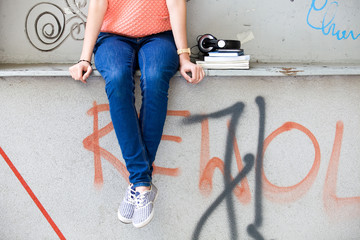 Teenage girl and graffiti