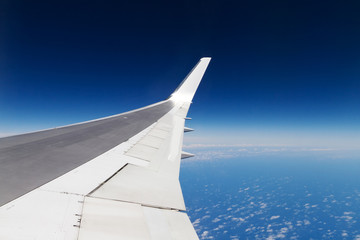 Wing of the plane at flight