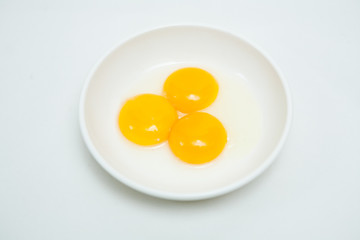 The appearance of three egg yolks