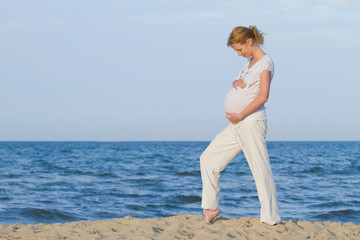 pregnant woman on beach