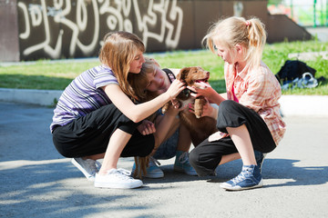 Teenage girls with a puppy © Wrangler