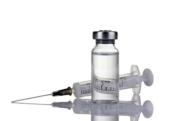 medical ampoules and syringe isolated on white