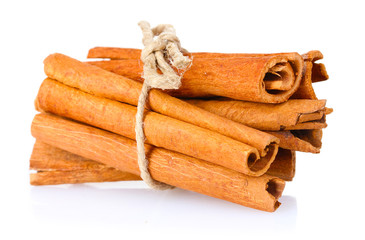 cinnamon sticks isolated on white