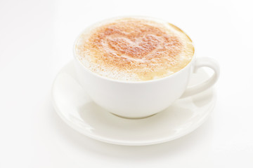 cappuccino in a cup in the shape of hearts isolated on white