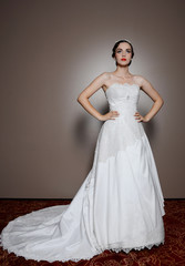 Fototapeta premium Beautiful girl in wedding dress