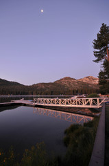 Fototapeta premium Dock on a calm lake with reflection