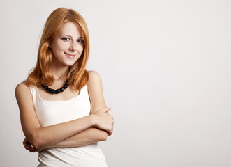 Fototapeta premium Closeup portrait of cute young redhead business woman
