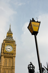 Fototapeta na wymiar Big Ben with taxi sign