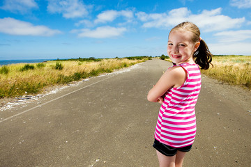 happy child on a quiet country road