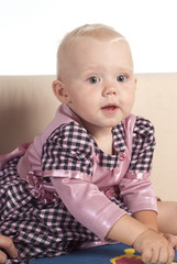 Fototapeta premium little girl on sofa